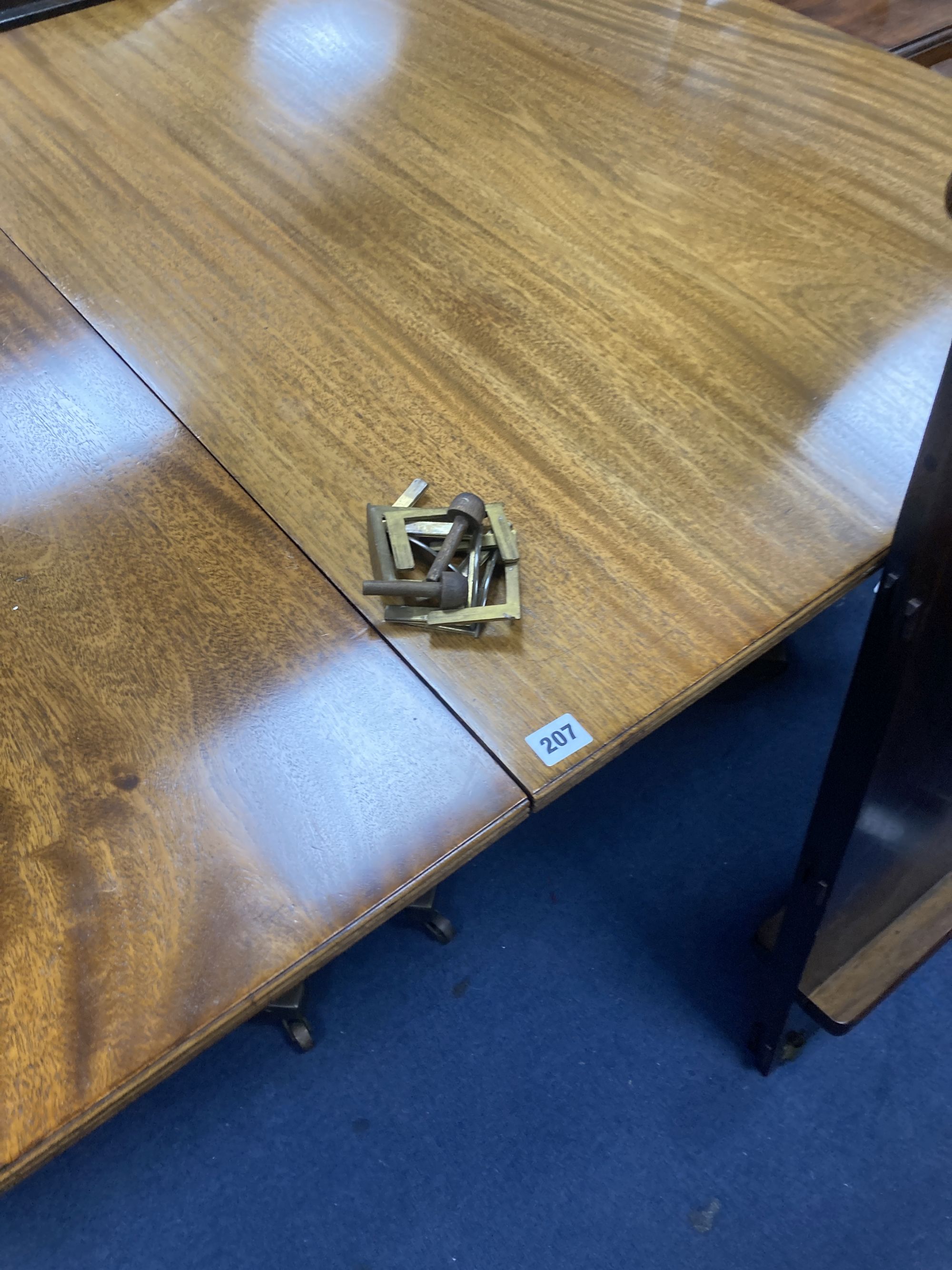 A George III style mahogany twin pedestal dining table, with two spare leaves, length 175cm, depth 106cm, height 71cm